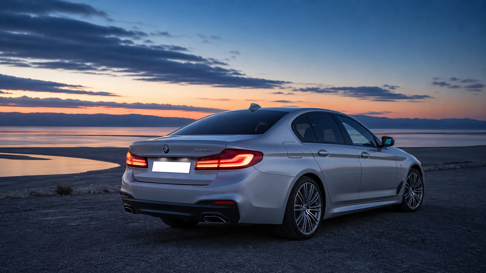 2019 BMW 530e M Sport on the Dead Sea road at blue hour
