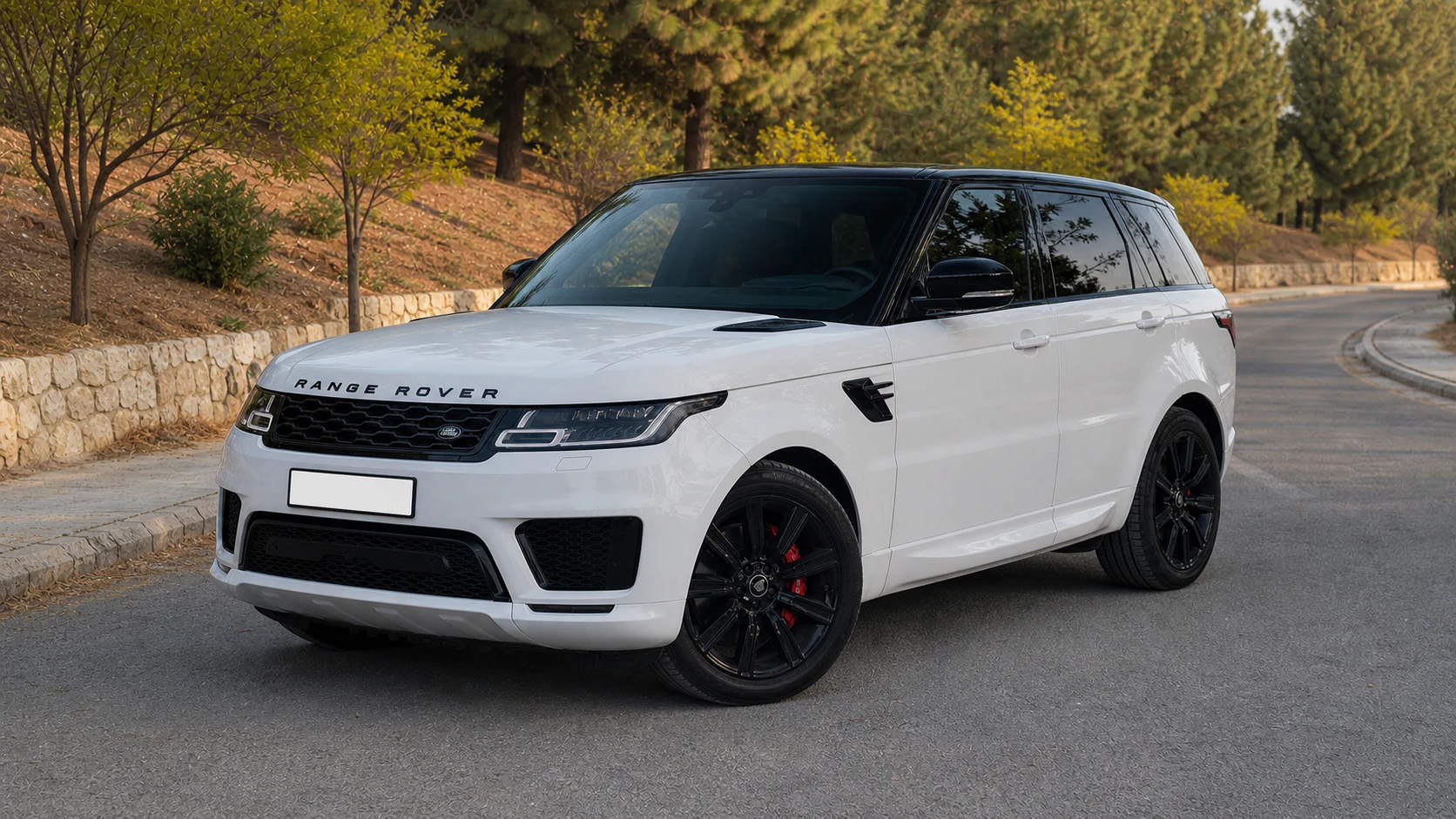 2021 Range Rover Sport L494 in white on an Amman hillside road