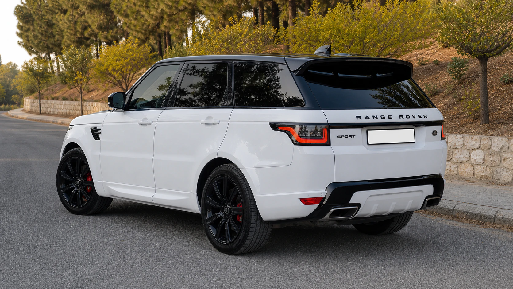 2021 Range Rover Sport L494 rear three-quarter with black roof and wheels
